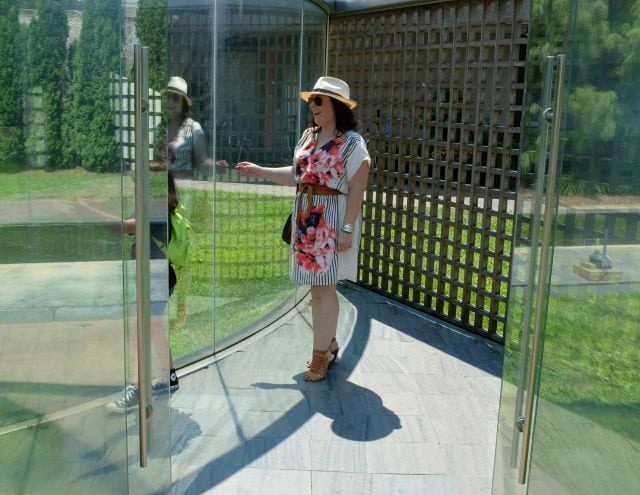 Wardrobe Oxygen wearing a Corey floral dress from Gwynnie Bee with Vince Camuto sandals