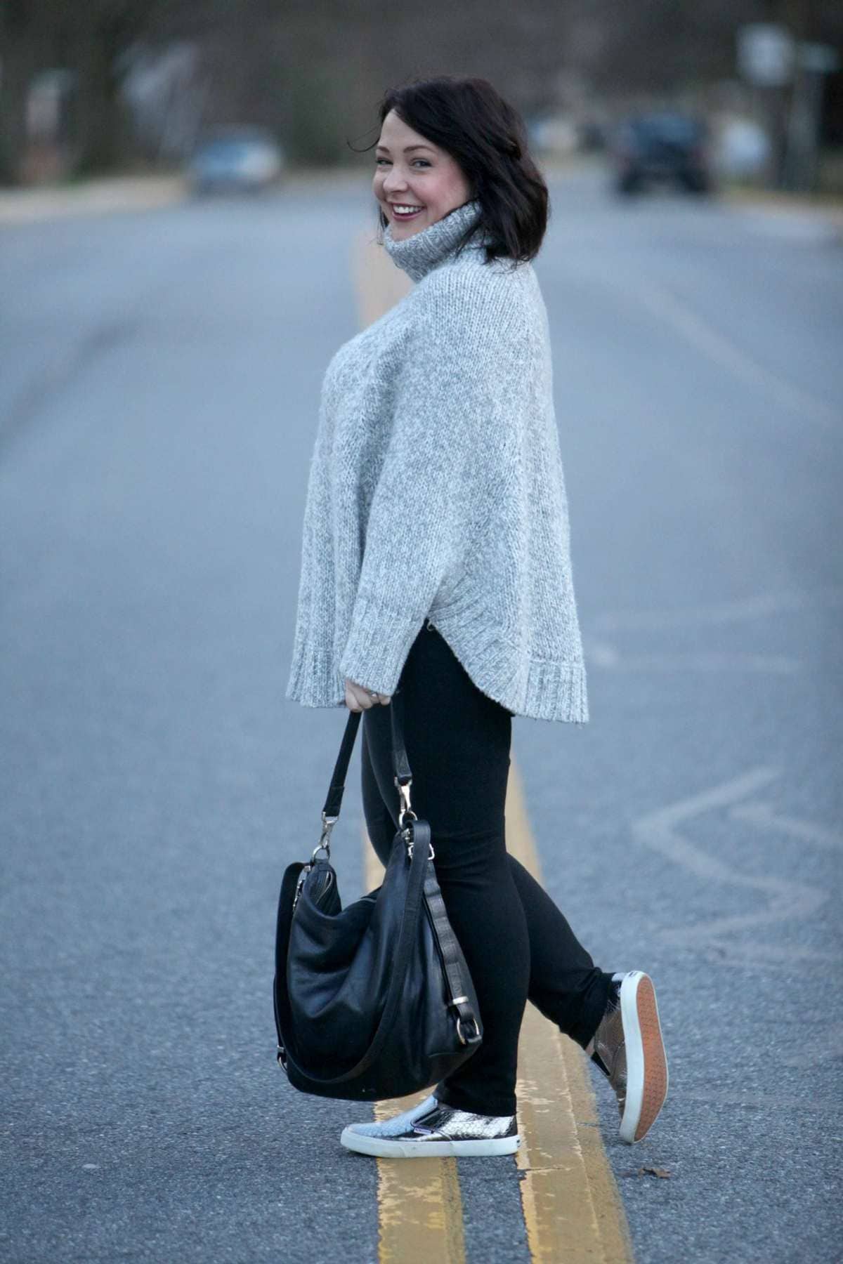 Wardrobe Oxygen featuring a turtleneck poncho sweater, leather front ponte pants, metallic Superga slip-on sneakers and Rough & Tumble Bags