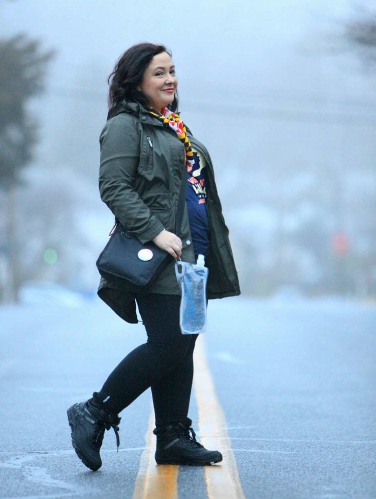 Alison Gary dressed in a field jacket and hiking boots for the 2017 Womens March