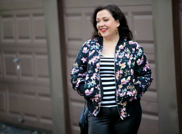 Wardrobe Oxygen, over 40 fashion blogger in floral bomber from Gwynnie Bee and faux leather front ponte pants