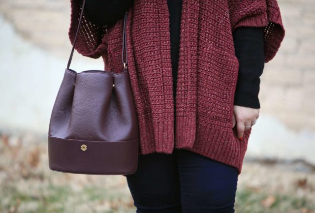 Wardrobe Oxygen,, over 40 blogger wearing a Melissa McCarthy Seven7 cardigan and Dagne Dover oxblood leather bucket bag