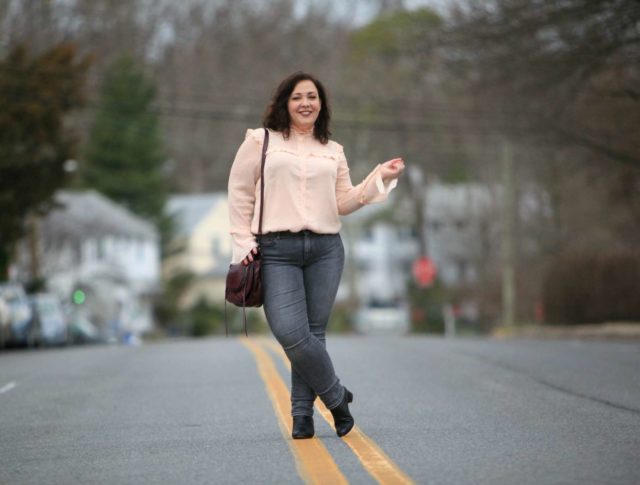 Wardrobe Oxygen in a peach ELOQUII blouse with grey Gap jeans