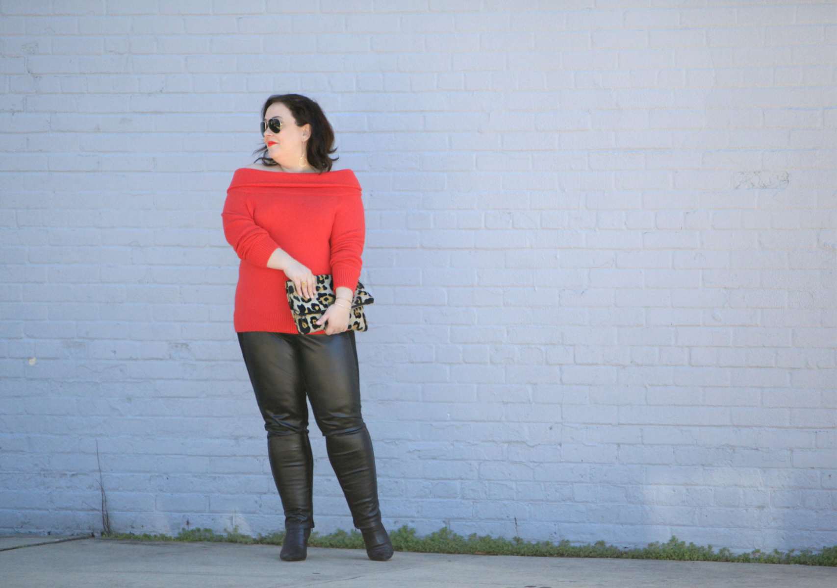 Wardrobe Oxygen, over 40 size 14 fashion blogger in a Vince Camuto sweater from Gwynnie Bee styled with Stella Carakasi faux leather front ponte pants and a leopard clutch from Love,Cortnie wear red