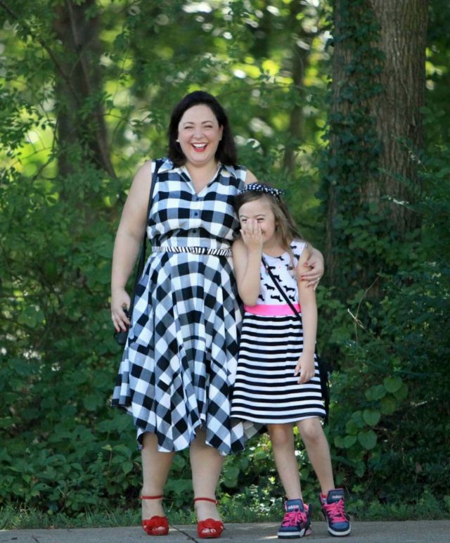 Wardrobe Oxygen in a black and white gingham dress from Gwynnie Bee with a cabi zebra calfhair belt and Naturalizer Adelle red suede platform sandals