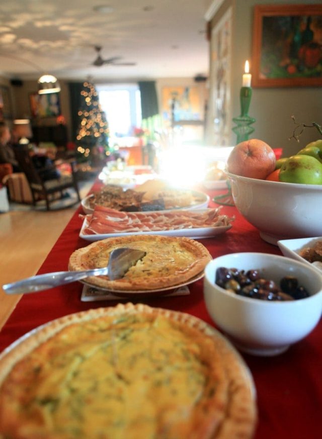 display of brunch food on a red tablecloth