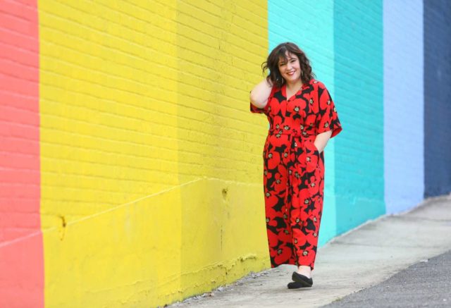 Wardrobe Oxygen in a red floral jumpsuit from ELOQUII with Rothy's flats