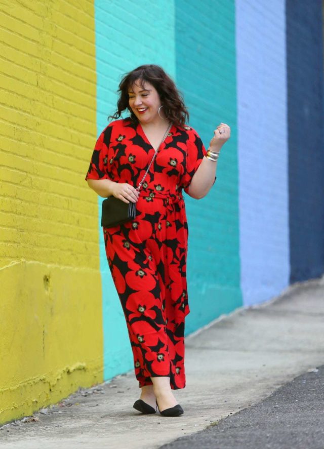 Wardrobe Oxygen in a red floral jumpsuit from ELOQUII with Rothy's flats