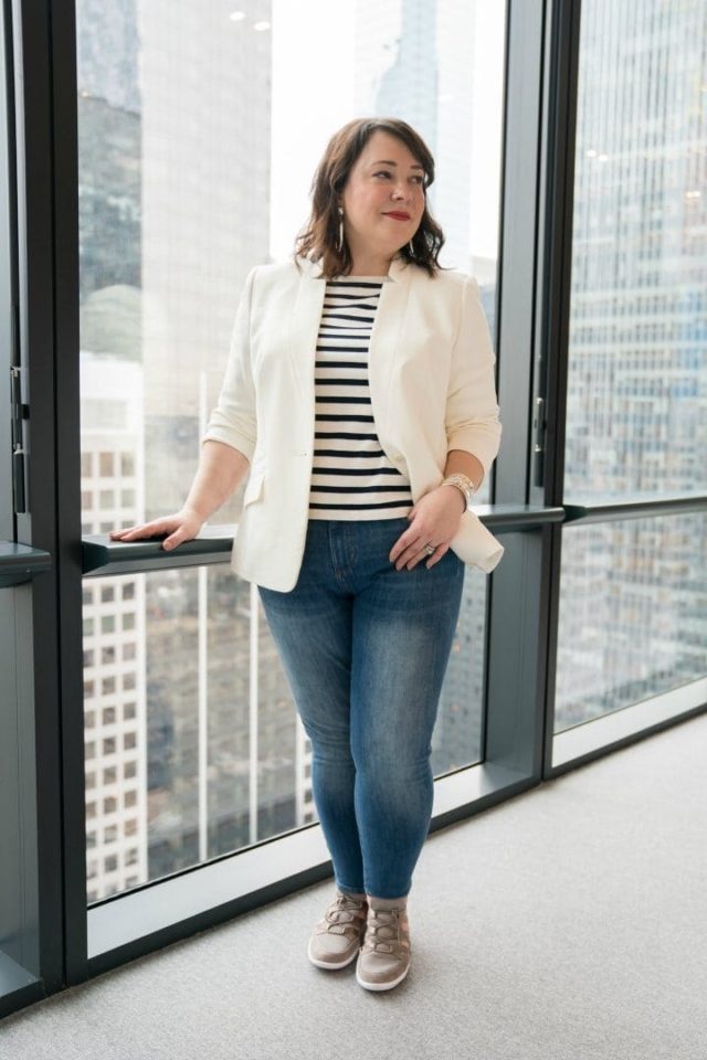 Wardrobe Oxygen in an ivory Talbots blazer, J. Crew striped knit top, Banana Republic skinny ankle jeans, and Jambu Azalea sneakers.