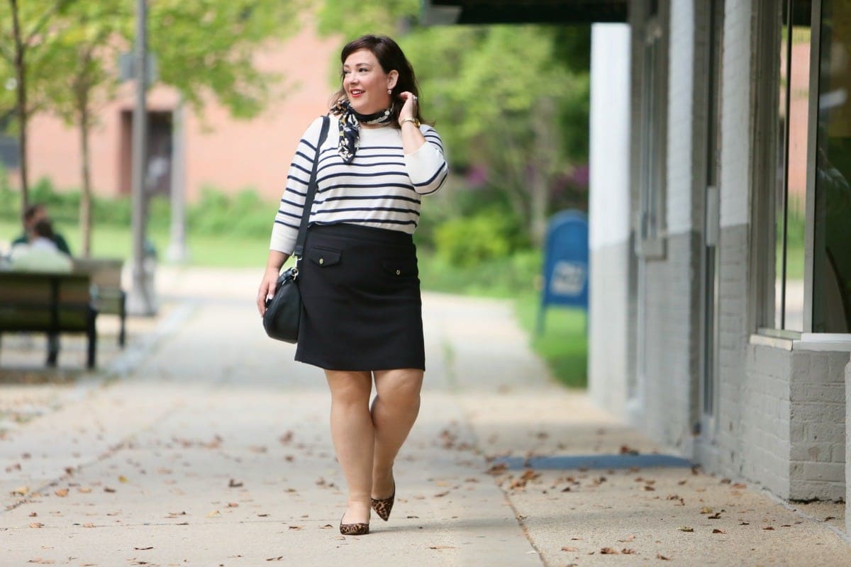 Wardrobe Oxygen in a Breton stripe top and black ponte knit skirt from LOFT styled with a floral scarf and leopard kitten heel pumps