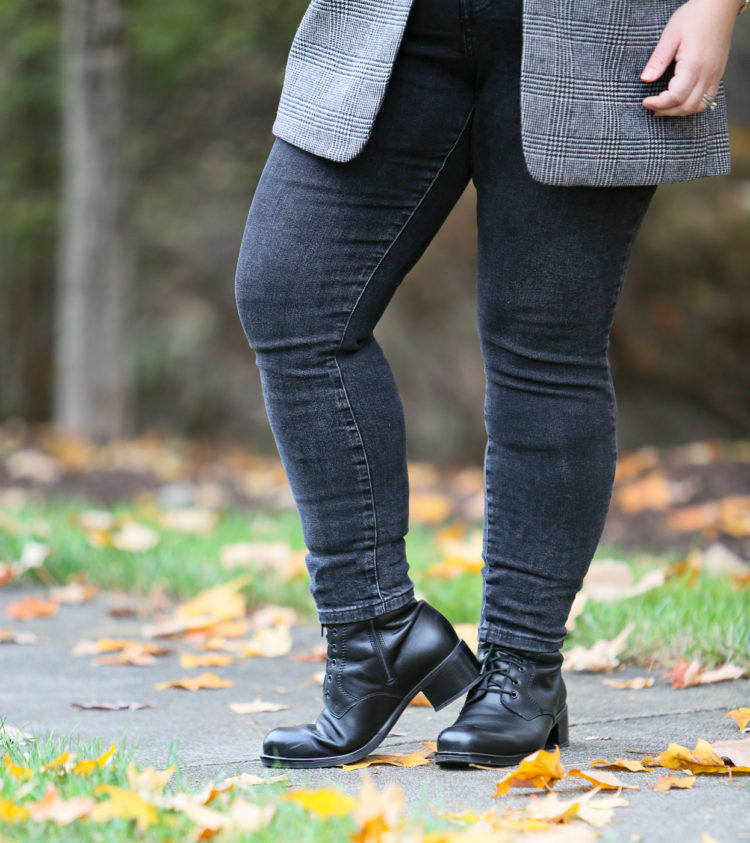 Close-up of gray button-fly jeans by Everlane.