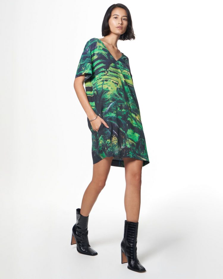 model from The Kit NYC website wearing the Kyle Dress in green