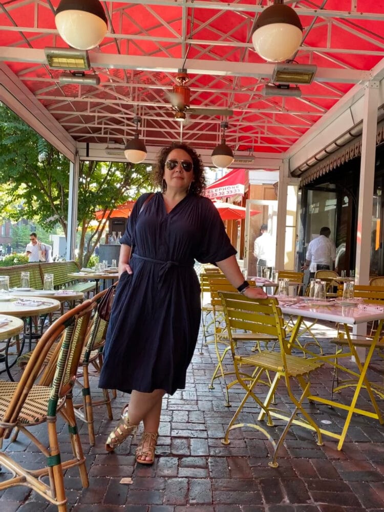 Alison Gary of Wardrobe Oxygen, a 5'3" size 14/16 woman wearing the ever by X dress in navy at Le Diplomate restaurant in Washington DC.