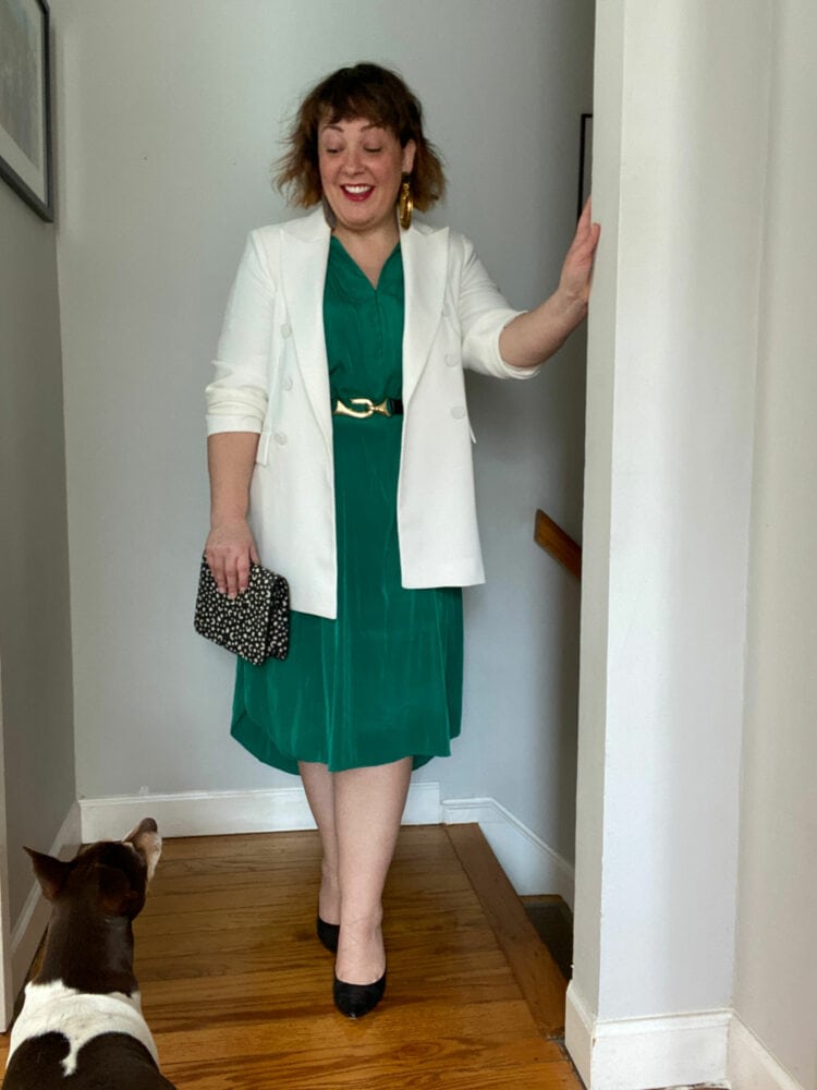 Alison Gary of Wardrobe Oxygen wearing a green Ever by X dress styled with a gold and leather belt and a relaxed white blazer