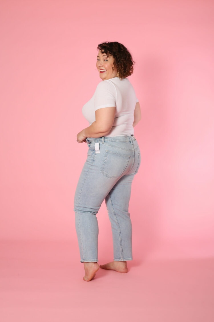 Side view of Alison in the 32 short Cheeky Straight High Rise Jean.