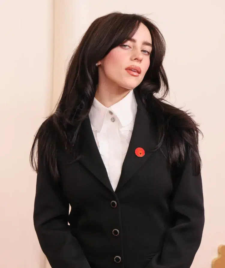 billie eilish wearing a white button down shirt and black blazer