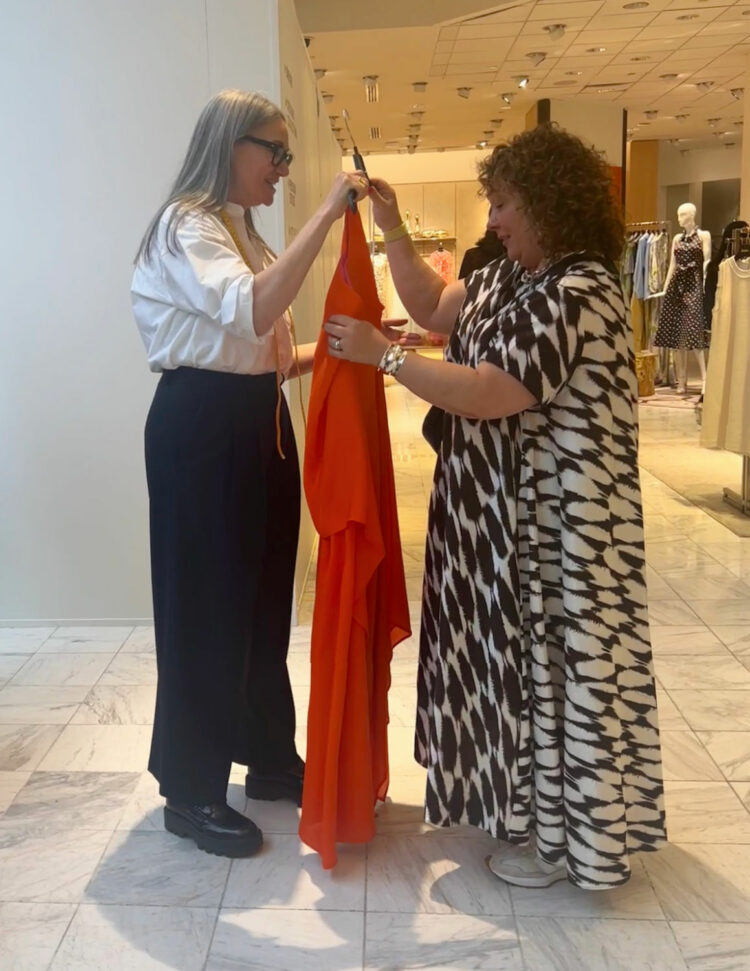 Shanna of Pari Passu giving Alison Gary of Wardrobe Oxygen her made-to-measure evening gown