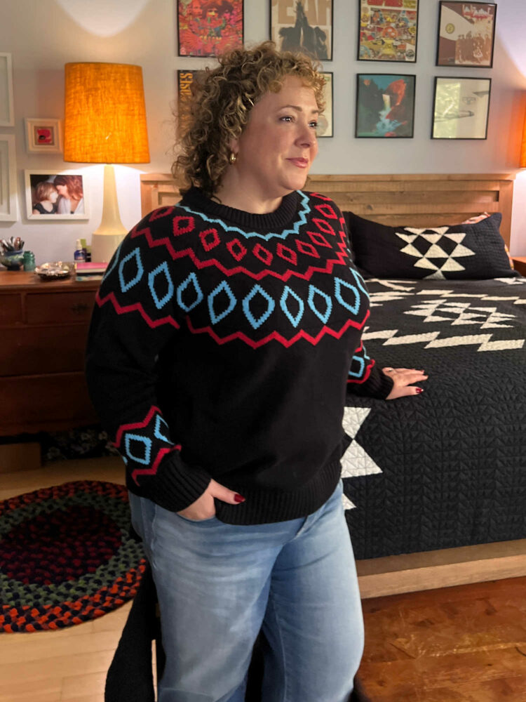 Alison Gary of Wardrobe Oxygen in a Lane Bryant black Fair Isle sweater and jeans