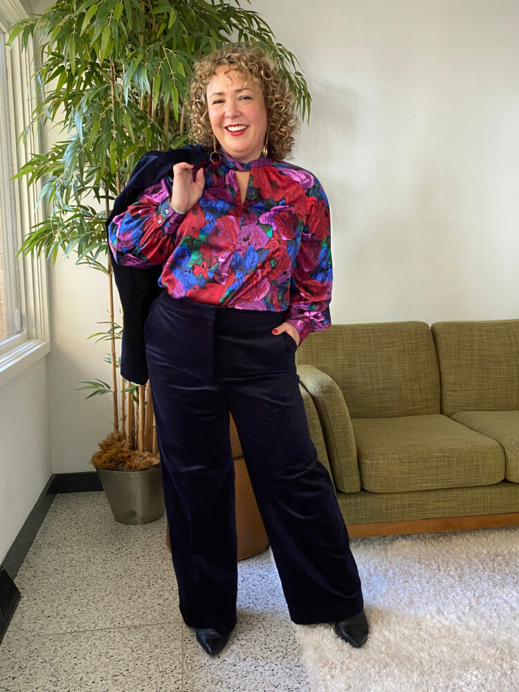 Alison of Wardrobe Oxygen in a Talbots velveteen pantsuit and silky printed blouse