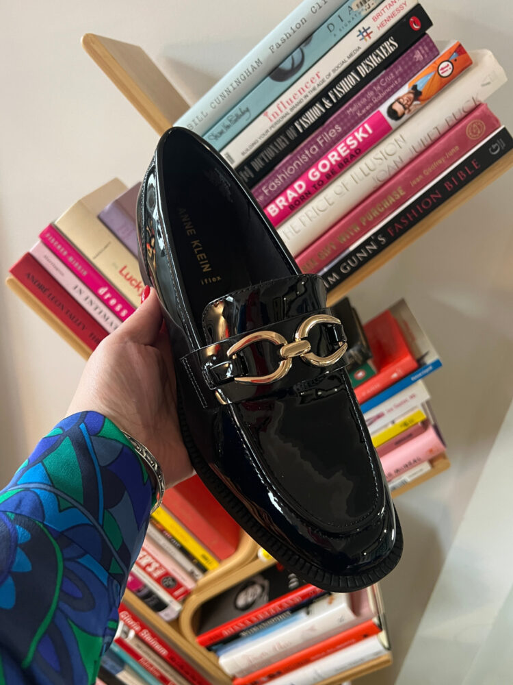 The Anne Klein Korrie black patent loafer with gold hardware