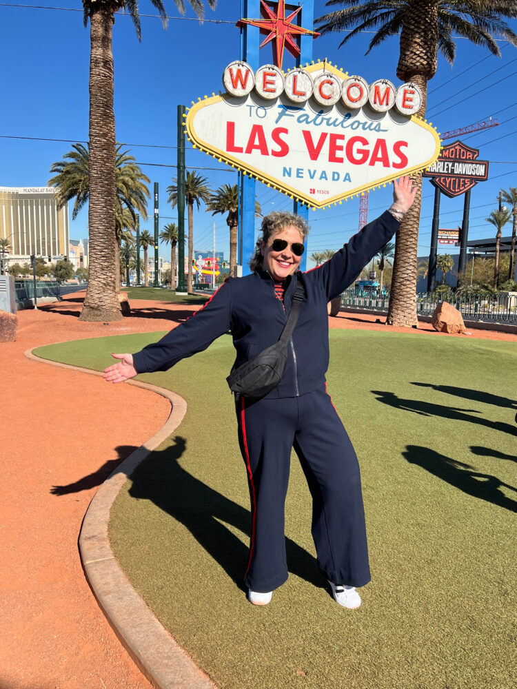 Alison Gary in a navy ponte track suit | 50th Birthday in Vegas in January