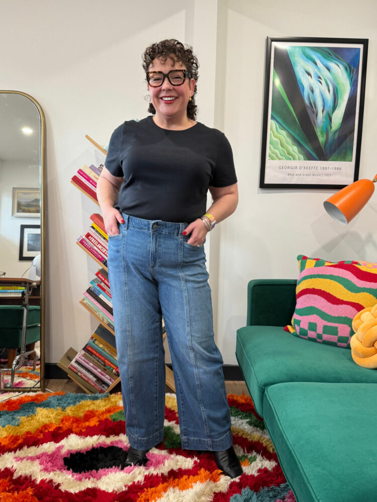 Alison Gary in a black t-shirt tucked into the Talbots Classic Jean Trousers - Renwick Wash